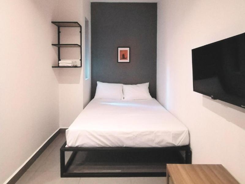 Hotel cápsula Adhoc Mro Monterrey